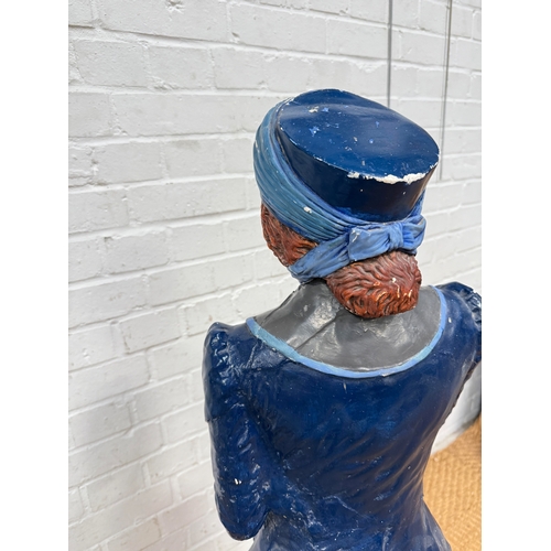 300 - A LARGE PAINTED PLASTER FIGURE OF A LADY, POSSIBLY OF A SUFFRAGETTE
111 cm