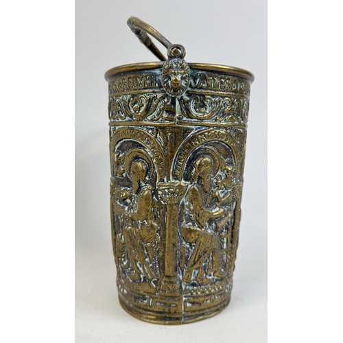 302 - AN 18TH CENTURY OR EARLIER BRASS HOLY WATER BUCKET WITH REPOUSSE RELIGIOUS SCENE
19cm H
Provenance: ... 