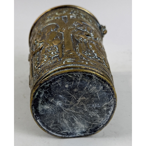 302 - AN 18TH CENTURY OR EARLIER BRASS HOLY WATER BUCKET WITH REPOUSSE RELIGIOUS SCENE
19cm H
Provenance: ... 