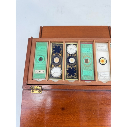 305 - A COLLECTION OF VICTORIAN MICROSCOPE SLIDES IN WOODEN CASE
To include well renowned names such as Am... 