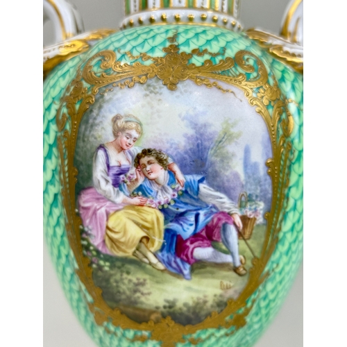 322 - A PAIR OF FRENCH PORCELAIN URNS AND COVERS, GREEN GROUND WITH PAINTED CARTOUCHES DEPICTING TWO LOVER... 