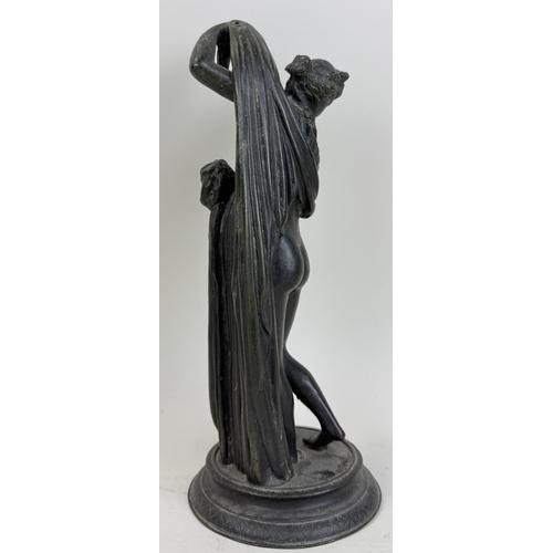 327 - A 19TH CENTURY BRONZE SCULPTURE OF THE VENUS CALLIPYGE
28 cm H