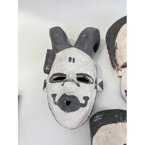 335 - A COLLECTION OF EIGHT PAINTED IBIBIO WOODEN AFRICAN HEADS
Purchased from Bonhams, Lots Road.... 