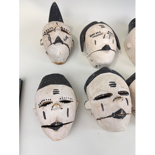 337 - A COLLECTION OF THIRTEEN PAINTED IBIBIO WOODEN AFRICAN MASKS
Purchased from Bonhams, Lots Road.... 