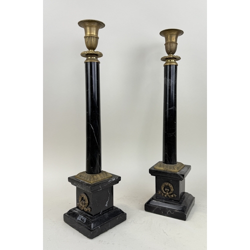 343 - A PAIR OF CLASSICAL COLUMN MARBLE AND BRASS CANDLESTICKS
52 cm H