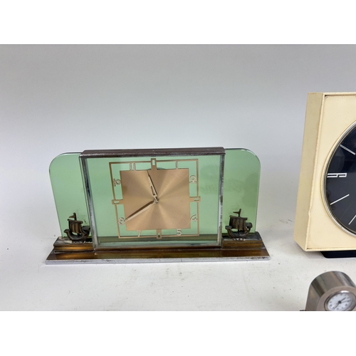 347 - A COLLECTION OF EIGHT CLOCKS TO INCLUDE ART DECO AND BRASS 8 DAY MOVEMENT MANTEL CLOCK
Largest: 16cm... 