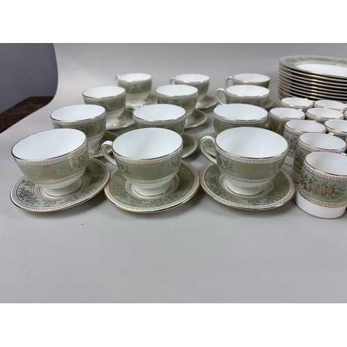 474 - A GOLD COLUMBIA WEDGWOOD DINNER AND PART TEA SERVICE IN SAGE GREEN
Includes dinner plates, side plat... 