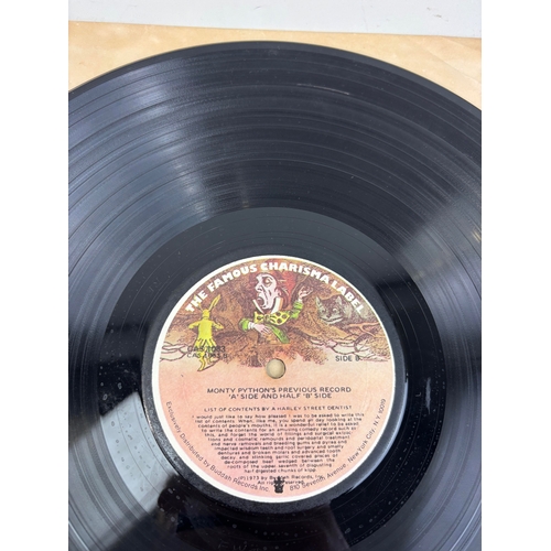 476 - MONTY PYTHON'S PREVIOUS RECORD SIGNED BY MEMBERS TO INCLUDE TERRY JONES