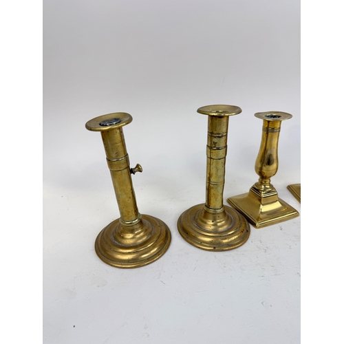 497 - SELECTION OF BRASS CANDLESTICKS ALONG WITH OTHER METALWARE