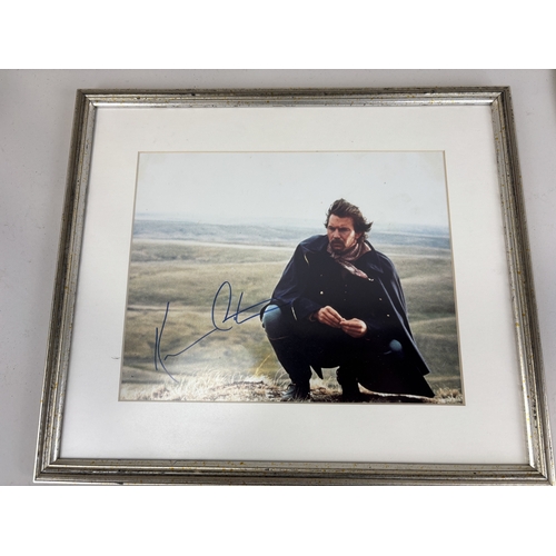 508 - A SIGNED PHOTO OF KEVIN COSTNER IN DANCES WITH WOLVES TOGETHER WITH A SIGNATURE FROM JON VOIGHT AND ... 