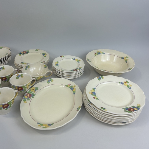 521 - A GROUP OF ROYAL DOULTON MINDEN CHINA TO INCLUDE TEA CUPS, DINNER PLATES, SIDE PLATES AND SERVING DI... 