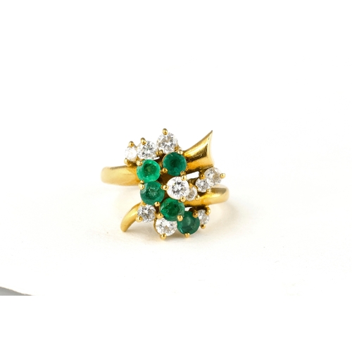 10 - AN 18CT GOLD, EMERALD AND DIAMOND RING
Weight: 8.6gms