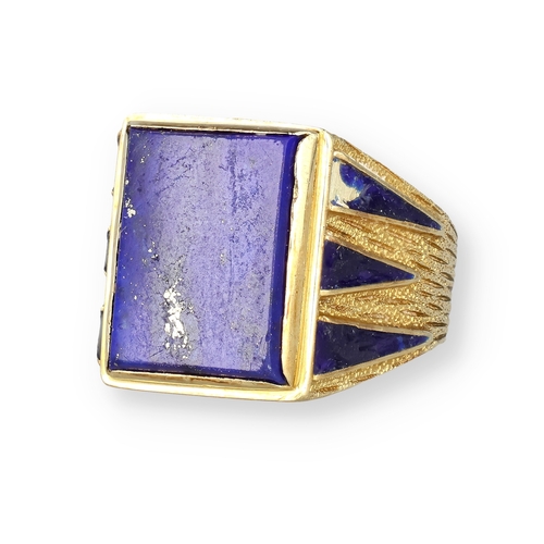 11 - A GENTLEMAN'S 14 CARAT GOLD TEXTURED SIGNET RING, SET WITH A RECTANGULAR LAPIS LAZULI PLAQUE
The sho... 