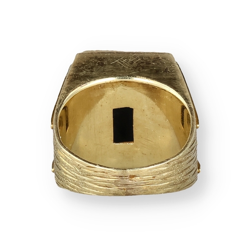 11 - A GENTLEMAN'S 14 CARAT GOLD TEXTURED SIGNET RING, SET WITH A RECTANGULAR LAPIS LAZULI PLAQUE
The sho... 
