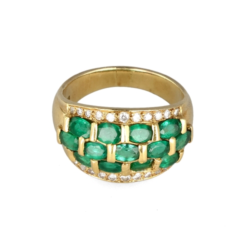 12 - AN 18CT GOLD RING SET WITH EMERALDS AND DIAMONDS
Weight: 12gms