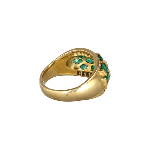 12 - AN 18CT GOLD RING SET WITH EMERALDS AND DIAMONDS
Weight: 12gms