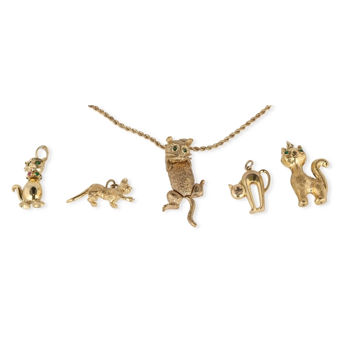 14 - A MODERN 9CT GOLD ARTICULATED PENDANT IN THE FORM OF A CAT, WITH STONE SET EYES, ON A 9CT GOLD TWIST... 