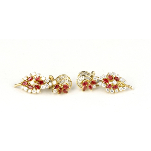 3 - AN 18CT GOLD, DIAMOND AND RUBY JEWELLERY SET COMPRISING A PAIR OF EARRINGS AND A RING
Total weight: ... 