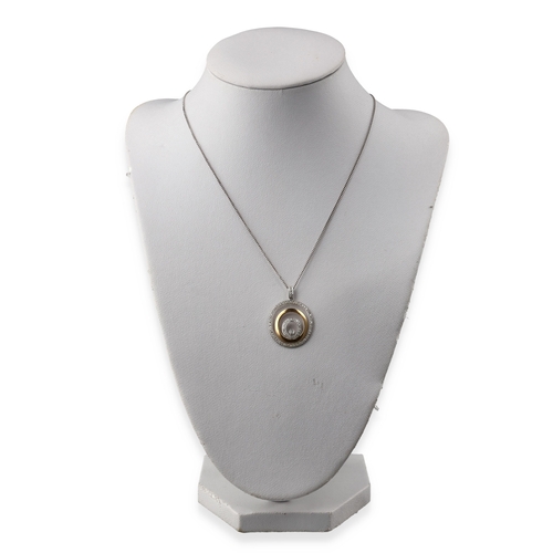 31A - AN 18CT YELLOW AND WHITE GOLD PENDANT AND NECKLACE WITH 46 POINTS OF DIAMONDS
Weight: 4.1gms... 