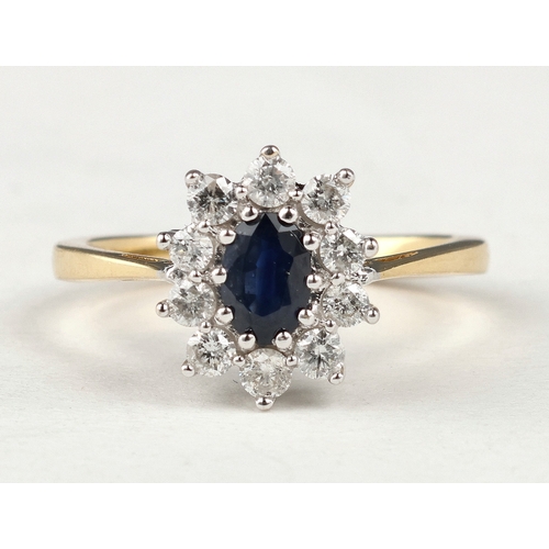32 - AN 18CT GOLD SAPPHIRE AND DIAMOND CLUSTER RING, 50 POINTS DIAMONDS
Weight: 3.9gms