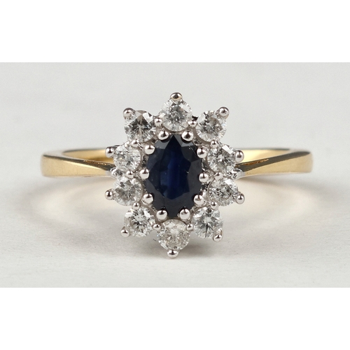32 - AN 18CT GOLD SAPPHIRE AND DIAMOND CLUSTER RING, 50 POINTS DIAMONDS
Weight: 3.9gms