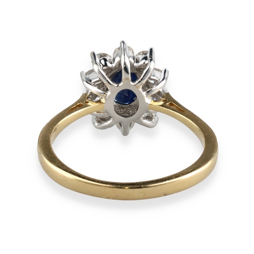 32 - AN 18CT GOLD SAPPHIRE AND DIAMOND CLUSTER RING, 50 POINTS DIAMONDS
Weight: 3.9gms