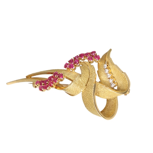 32A - AN 18CT GOLD BROOCH SET WITH RUBIES AND DIAMONDS
Weight; 16.6gms
