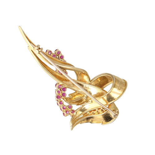 32A - AN 18CT GOLD BROOCH SET WITH RUBIES AND DIAMONDS
Weight; 16.6gms