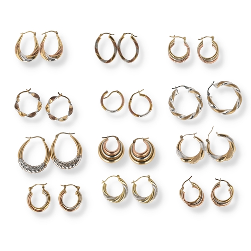 34 - A COLLECTION OF TWELVE PAIRS OF TWO AND THREE COLOUR 9 CARAT GOLD HOOP EARRINGS
Of varying designs, ... 