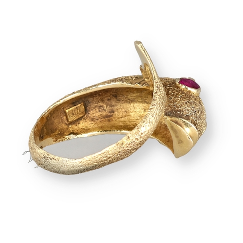4 - AN 18 CARAT GOLD DRESS RING, CAST AS A DOLPHIN, WITH TEXTURED FINISH AND SET WITH FIVE RUBIES
8.4gms... 