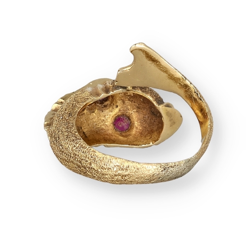 4 - AN 18 CARAT GOLD DRESS RING, CAST AS A DOLPHIN, WITH TEXTURED FINISH AND SET WITH FIVE RUBIES
8.4gms... 