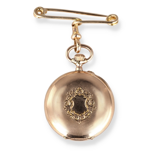 43 - A 14CT GOLD FOB WATCH ON 15CT GOLD PIN
Weight: 30.8gms