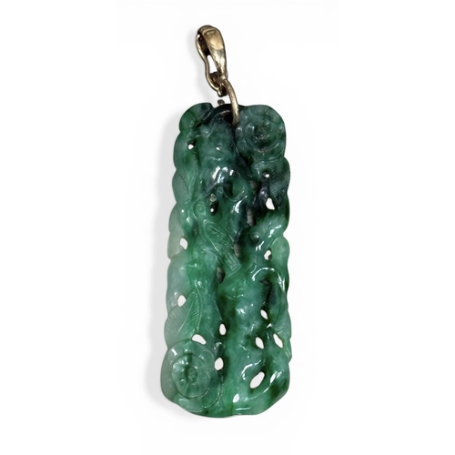 48A - A CHINESE GREEN CARVED JADE PENDANT WITH GOLD CLASP
Weight: 6.1gms
Various green colours, including ... 