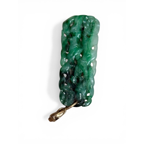 48A - A CHINESE GREEN CARVED JADE PENDANT WITH GOLD CLASP
Weight: 6.1gms
Various green colours, including ... 
