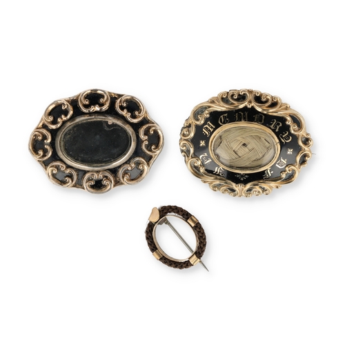 52 - A VICTORIAN MEMEMTO MORI GOLD AND BLACK ENAMEL BROOCH, TOGETHER WITH A SIMILAR GOLD PLATED MOURNING ... 