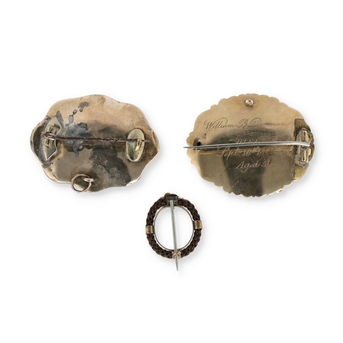 52 - A VICTORIAN MEMEMTO MORI GOLD AND BLACK ENAMEL BROOCH, TOGETHER WITH A SIMILAR GOLD PLATED MOURNING ... 