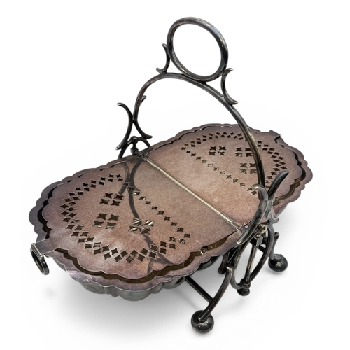 A VICTORIAN ELECTROPLATE BISCUIT WARMER OR TOASTER, OF CLAM SHELL ...