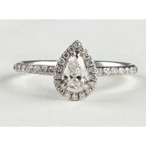 12 - A 14CT WHITE GOLD DIAMOND RING
Centre stone larger than 0.5ct
Weight: 2.1gms