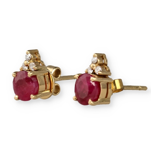 13 - A PAIR OF 18CT GOLD RUBY AND DIAMOND EARRINGS
4 gms