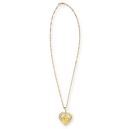 19 - A GOLD TWISTED FLATTENED CURB LINK NECKCHAIN WITH A HEART SHAPE PENDANT
The pendant, engine turned a... 