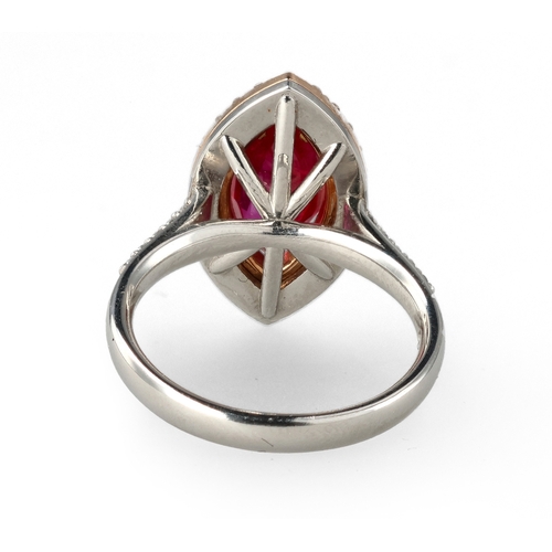 2 - A MODERN 18 CARAT WHITE GOLD AND PLATINUM RUBY AND DIAMOND RING
The marquise cut ruby, weight 2.32ct... 
