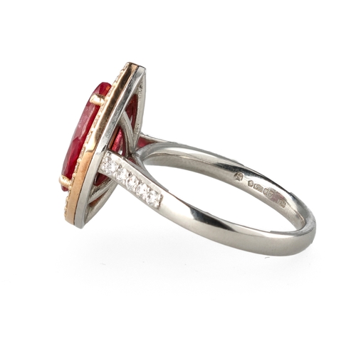 2 - A MODERN 18 CARAT WHITE GOLD AND PLATINUM RUBY AND DIAMOND RING
The marquise cut ruby, weight 2.32ct... 