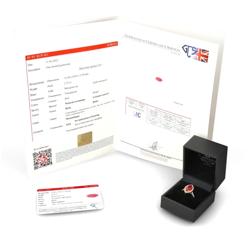 2 - A MODERN 18 CARAT WHITE GOLD AND PLATINUM RUBY AND DIAMOND RING
The marquise cut ruby, weight 2.32ct... 