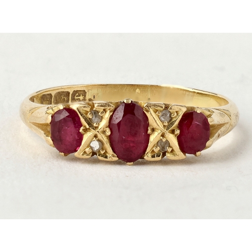 20 - A VICTORIAN 18CT GOLD RUBY AND DIAMOND RING
3.8 gms
With associated tooled red leather box.... 
