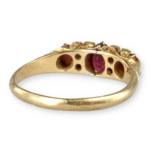 20 - A VICTORIAN 18CT GOLD RUBY AND DIAMOND RING
3.8 gms
With associated tooled red leather box.... 