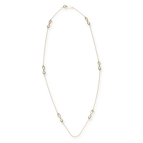 26 - TIFFANY & CO: AN 18 CARAT GOLD NECKLACE
The circular links interspaced with six figure of eight ... 
