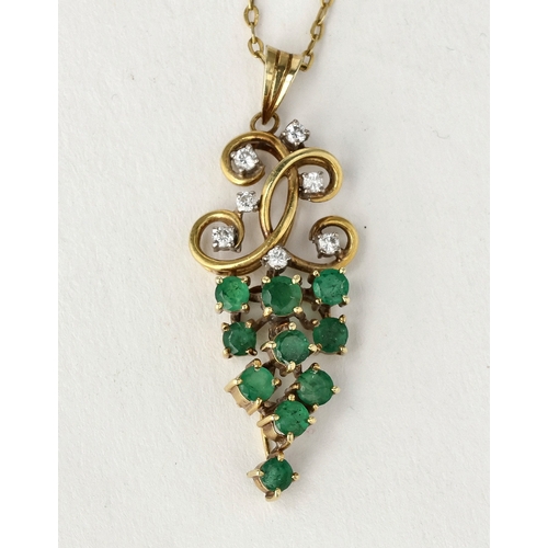 38 - AN 18CT GOLD PENDANT SET WITH DIAMONDS AND EMERALDS
Weight: 5.1gms 
With associated metal chain. ... 