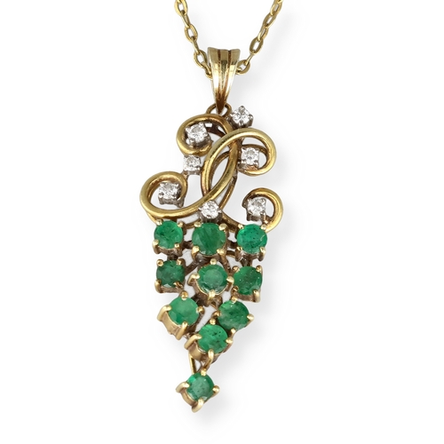 38 - AN 18CT GOLD PENDANT SET WITH DIAMONDS AND EMERALDS
Weight: 5.1gms 
With associated metal chain. ... 