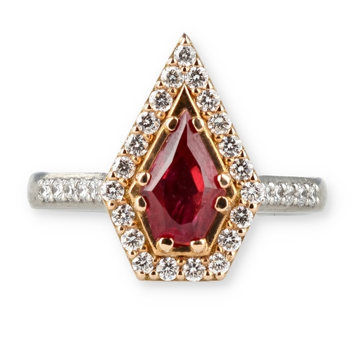 4 - A MODERN 18 CARAT WHITE GOLD AND PLATINUM RUBY AND DIAMOND RING
The fancy cut ruby, weight 1.35cts, ... 