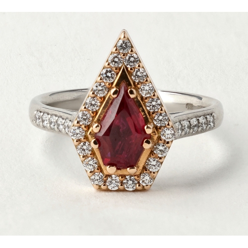4 - A MODERN 18 CARAT WHITE GOLD AND PLATINUM RUBY AND DIAMOND RING
The fancy cut ruby, weight 1.35cts, ... 